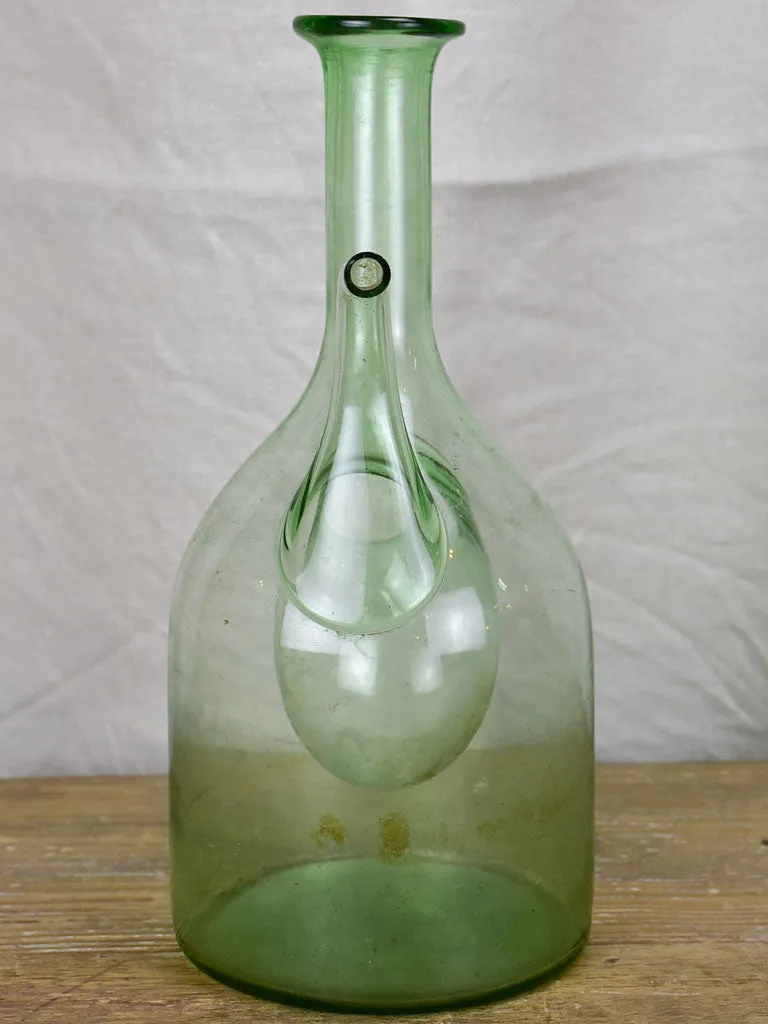 Antique French glass pouring bottle