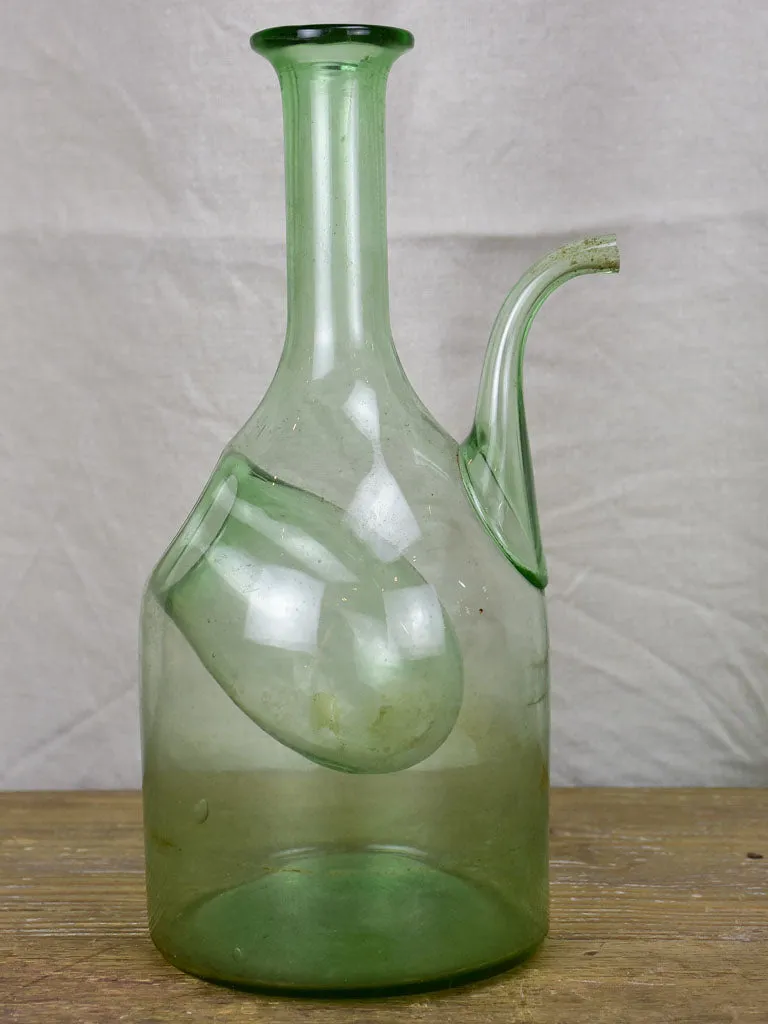 Antique French glass pouring bottle
